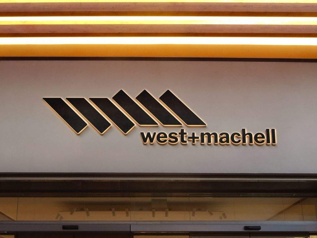 West and Machell architect logo design
